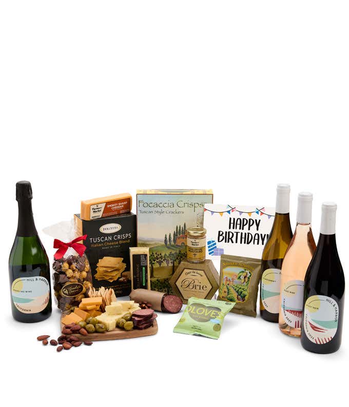 A wine and cheese gift set featuring 4 bottles of California wine - sparkling, rosé, white, and red. Includes a variety of gourmet cheeses, crackers, olives, almonds, summer sausage, and condiments topped with a Happy Birthday Card.