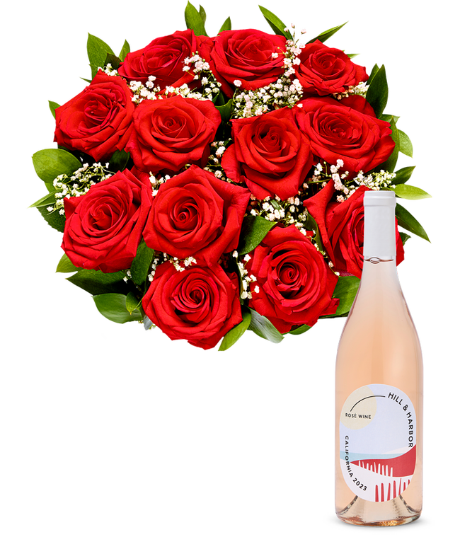 Partial image of A bouquet of vibrant red roses arranged in a clear glass vase, surrounded by small white flowers and lush green leaves, paired with a bottle of rose wine from California, 2023, featuring a stylish, minimalist label. without vase.